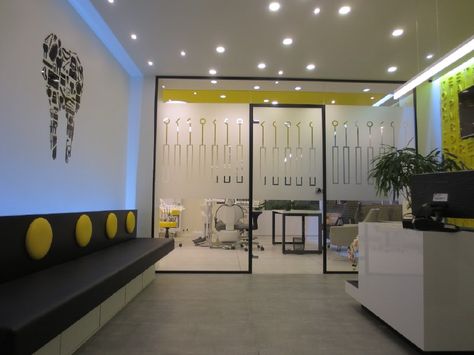 dental office yellow interior design architecture circle open space dentist dentistry lighting modern functional space graphic color furniture Yellow Interior Design, Glass Sticker Design, Office Yellow, Dental Advertising, Window Signage, Dental Office Design Interiors, Color Furniture, Dental Office Decor, Office Designs