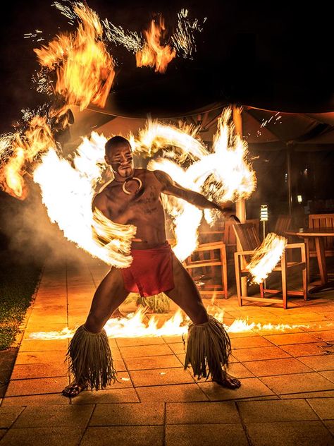 Olympus Visionary Jay Dickman captured the ancient art of Samoa fire dancing with the M.ZUIKO 25mm f1.2 PRO lens. Like fire dancing, the lens delivers coordination and masterful timing.   Captured with the OM-D E-M1 Mark II. Polynesian Fire Dancer, Fire Dancing, Hawaiian Dancers, Polynesian Men, Hawaiian Men, Fire Dancer, Hula Dance, Polynesian Culture, Hawaiian Culture