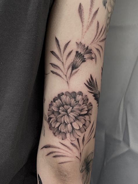 Marigold flower tattoo One of the hardest flowers to Execute in my style By Faisal Al-lami @tattoo.sal  ——- #dallastattooartist #dallastattoos #art #drawing #inked #blackandgreytattoo #dfwtattoos #sleevetattoo #marigold #marigoldtattoo #floraltattoo #flowertattoo #dallasyoga #dallasfitness #microrealism Black And Grey Marigold Tattoo, Marigold Black And White Tattoo, Marigold Flower Tattoo Sleeve, Marigold Flowers Tattoo, Black Marigold Tattoo, Marigold Tattoo Design Black And White, Black And White Marigold Tattoo, Mexican Marigold Tattoo, Rose And Marigold Tattoo