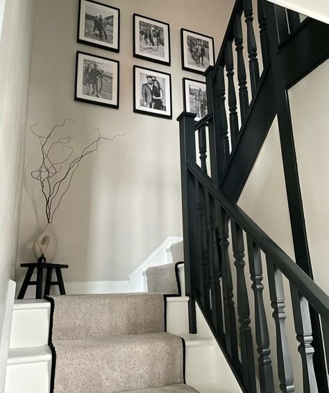 Cream And Black Staircase, Neutral Staircase Ideas, Black Hall Stairs And Landing, Beige And Black Stairs, Egyptian Cotton And Black Hallway, Black And White Hall Stairs And Landing, Black And White Landing, Top Of Stairs Corner Decor, Taupe Staircase