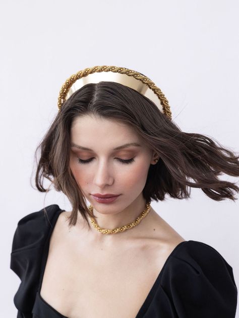 The Medici Crown is as regal as it is versatile. Worn stacked or singularly from the folds of the Medici Suite any combination is flawless. The all Gold alternative to the Danbury Collection is stunning. Available only in 14K Gold plate, this twisted brocade rope is straight from the treasures of yesteryear. Made in NYC. Medieval Hair Accessories, Russian Crown, Epona Valley, Coco Bliss, Headband Crown, Classic Updo, Luxury Hair Accessories, Bridal Handbags, Royalty Aesthetic