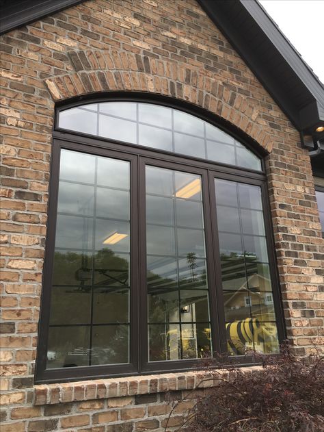 Arch Windows Exterior, Arch Window Design, Large Arch Window, Radius Window, Eyebrow Window, Bronze Windows, Front Window Design, Eyebrow Arch, Garage Windows