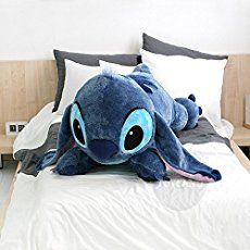 Get your snuggle on with this super sized Stitch Pillow, that is almost as big as a person! This humongous Stitch pillow is also a great statement piece in a bedroom for extra Disney flair. Inspired by Disney’s Lilo and Stitch, Hawaii’s favorite extra-terrestrial creature becomes a soft and cuddly keeper with this Stitch Pillow. Don’t … Lilo And Stitch Toys, Stitch Stuffed Animal, Lilo En Stitch, Lilo Und Stitch, Stitch Doll, Stitch Toy, Lilo Y Stitch, Lilo Et Stitch, Lilo E Stitch