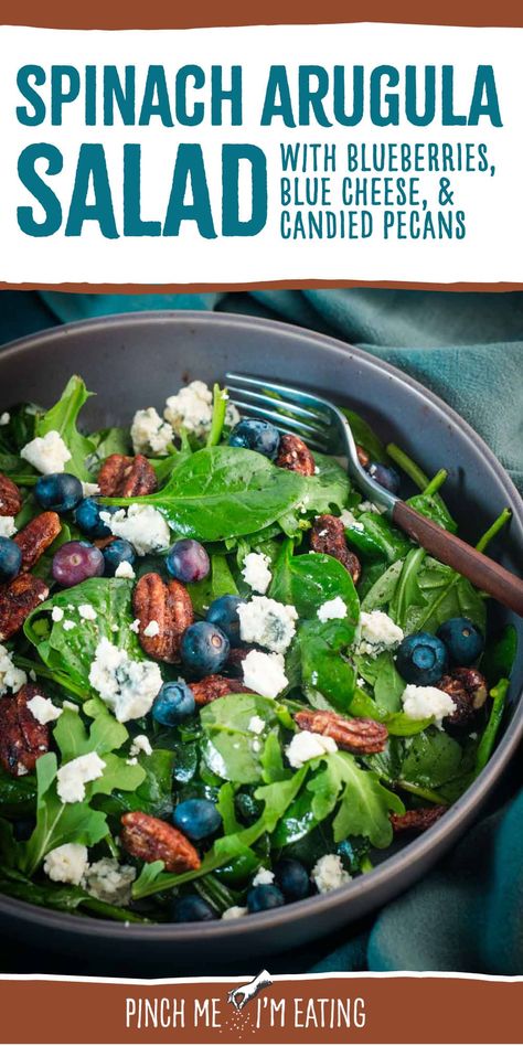 This easy arugula spinach salad recipe uses a simple balsamic vinaigrette and is topped with blueberries, blue cheese, and candied pecans. A perfect side salad, or try it with chicken for a light lunch or healthy dinner! Spinach And Arugula Salad, Salad With Blueberries, Simple Balsamic Vinaigrette, Cheese Salad Recipes, Honey Balsamic Vinaigrette, Easter Pie, Arugula Salad Recipes, Blue Cheese Salad, Italian Easter