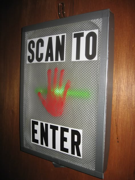 Hand scanner made from light cover , foam board and flashing glow stick. Area 51 Party Ideas, Scan To Enter, Science Themed Room, Hand Scanner, Space Halloween Decorations, Area 51 Party, Space Themed Party, Stellar Vbs 2023, Geheimagenten Party