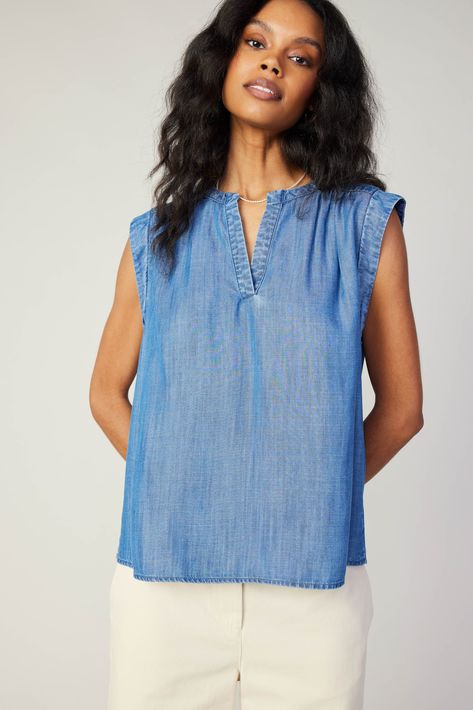 Chambray is a must for the warmer months. When temps go up, this relaxed tank top feels like a breath of fresh air. It's got a split neckline, gentle gathers, and stitched yoke and sleeves •split neckline •Neck placket •Stitched sleeve and rear yoke •Relaxed fit item number 2430042 100% Tencel Gentle cycle cold Round Top Collection, Athleisure Leggings, Boxy Top, A Breath Of Fresh Air, Chambray Top, Print Trends, Breath Of Fresh Air, Go Up, Sweater Sale