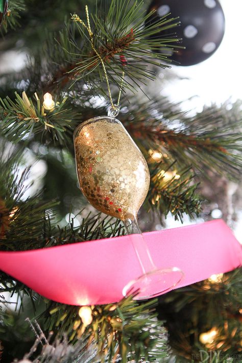 Wine glass ornament. This year's dream tree is full of pinks, blues, and greens! Come see this Kate Spade inspired colorful Christmas tree with lots of sass! It features hot pink ribbon, gold, glitter, polka dots, and stripes! #katespade #girlychristmas #christmastree #christmastreedecor Glamorous Christmas Tree, Hot Pink Ribbon, Glamorous Christmas, Christmas Tunes, Diy Playbook, Kate Spade Inspired, Buffalo Check Christmas, White Wrapping Paper, Clear Ornaments