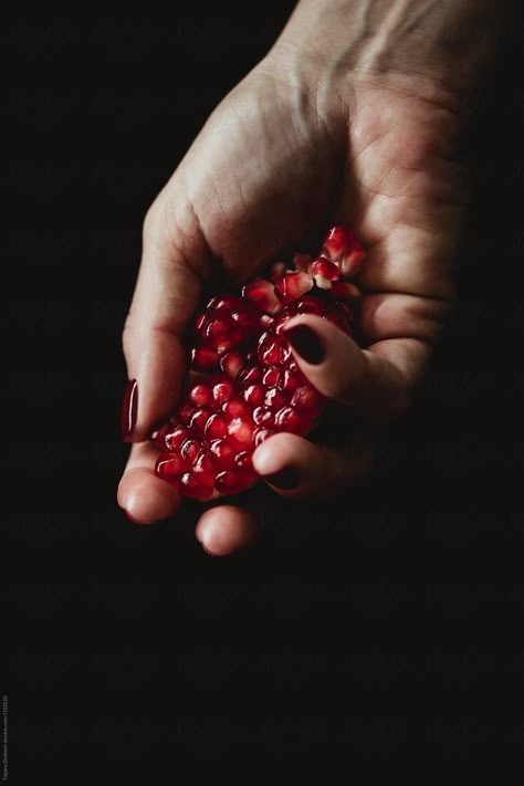 Woman Holding Pomegranate, Pomegranate Photoshoot, Hand Holding Pomegranate, Pomegranate Aesthetic Dark, Pomegranates Aesthetic, Pomegranate Symbolism, Pomegranate Pictures, Pomegranate Aesthetic, Pomegranate Art