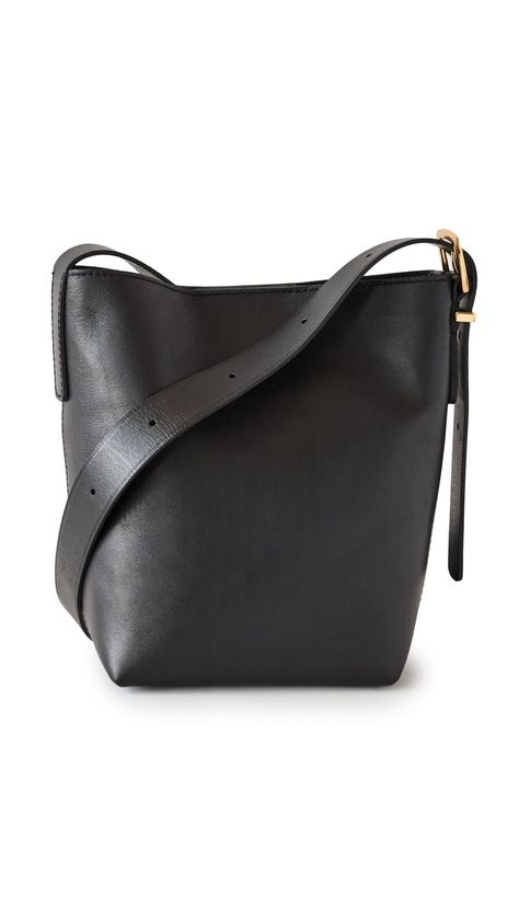 PRICES MAY VARY. Structured base Length: 8.75in / 22cm, Height: 8.25in / 21cm, Strap drop: 20in / 51cm, Depth: 4.75in / 12cm Hidden magnetic closure at top Patch interior pockets Adjustable straps The Chain-Strap Crossbody Bag in Leather Structured Bags For Women, Purse Trends, 2024 Aesthetic, Madewell Bags, Everyday Purse, Black Crossbody Bag, Structured Bag, Black Leather Crossbody Bag, Leather Bag Women