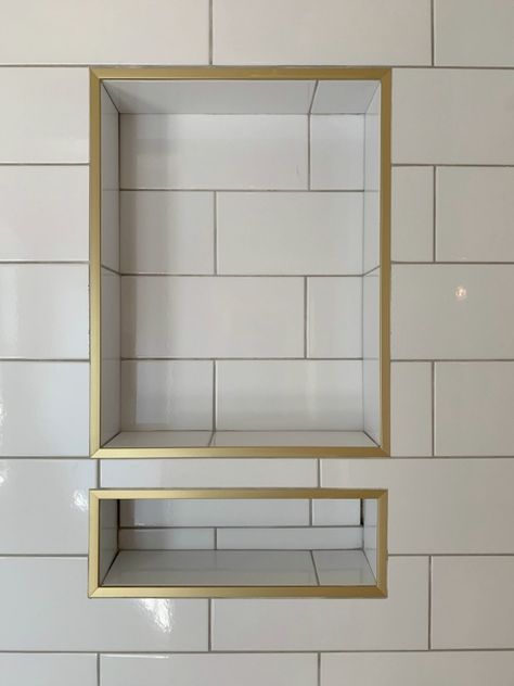 Bathroom Tile Gold Accents, Schluter Trim Bathroom, Gold Shower Niche, Schluter Shower Niche, Jack And Jill Bathroom Renovation, Niche Ideas Bathroom, Gold Tile Trim, Gold Trim Bathroom, Shower Niche Trim