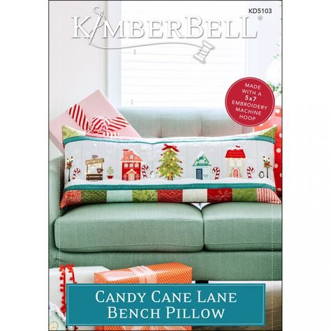 Candy Cane Lane Machine Embroidery CD By Kimberbell Welcome to Candy Cane Lane! Kimberbell's whimsical Bench Pillow celebrates the wonder of the holiday season Cocoa Stand, Kimberbell Designs, Candy Cane Lane, Bench Pillow, Lamp Posts, Pillow Embroidery, Bench Pillows, Machine Embroidery Applique, Cork Fabric