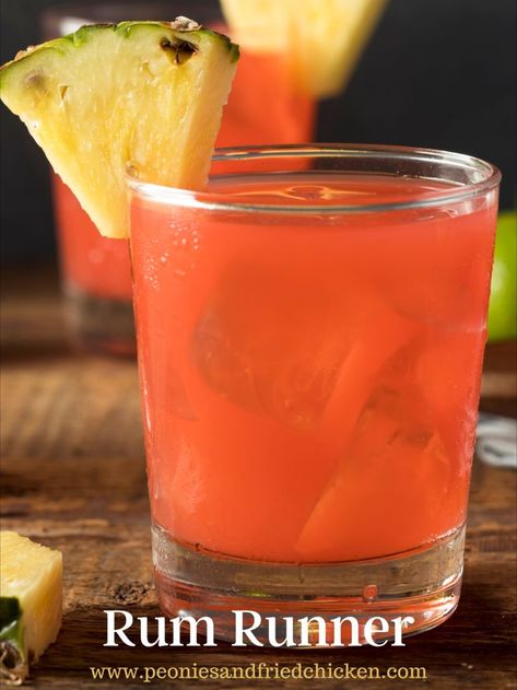 Want to transport to a tropical island? Then you have to try a Rum Runner this summer! This drink combines rum with the summer flavors of pineapple, orange, and blackberry! So for all our fans of summer rum cocktails, run to grab this recipe for the Rum Runner cocktail! #cocktail #summercocktail #summerdrink #rumrunner #rumrunnercocktail #rum #pineapplecocktail #orangecocktail #darkrum #lightrum Rum Runner Recipe, Summer Rum Cocktails, Flavored Liquor, Rum Runner, Fun Summer Drinks, Summer Flavors, Pineapple Cocktail, Cocktail Drinks Alcoholic, Orange Cocktails