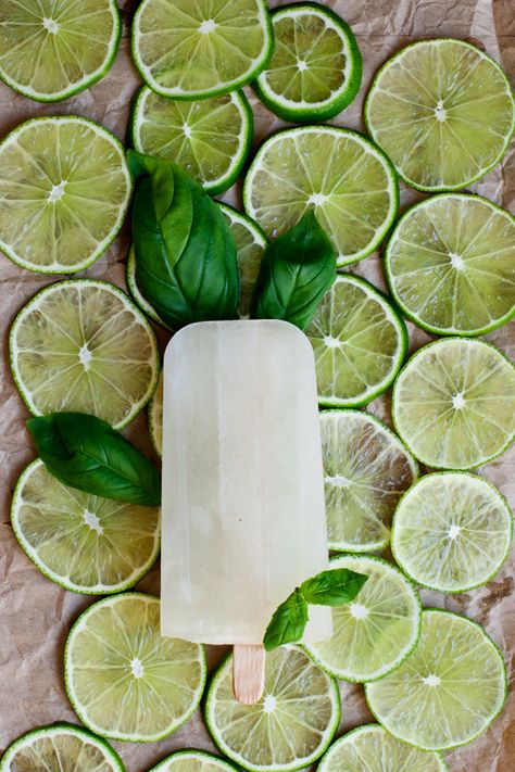 Lime-Basil-Gin Ice Pops: Icy and fresh. these are the grown-up version of lime-ade. Limeade Popsicles, Brazilian Limeade, Lime Popsicles, Coconut Popsicles, American Honey, Lime Basil, Ice Lolly, Milk Shakes, Ice Cream Popsicles