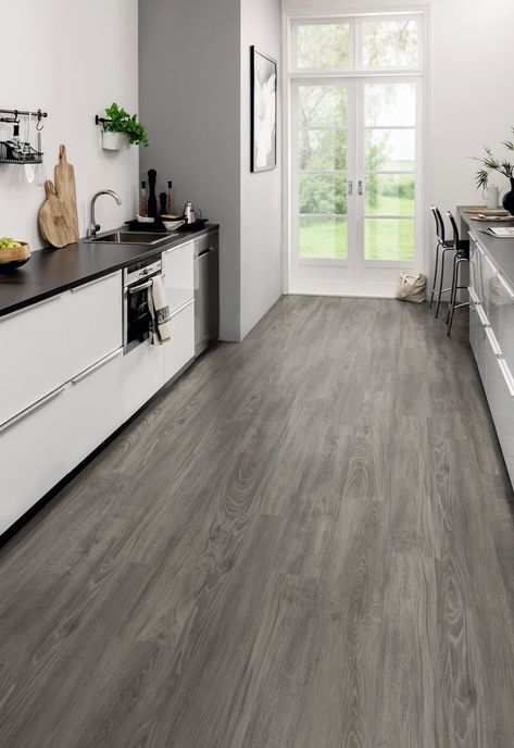 Grey Oiled Oak rigid core flooring shown in a black and white galley kitchen, followed by a close-up angled image. Elk Head, Residential Flooring, Flooring Projects, Stair Nosing, Basement Remodel, Vinyl Floor, Commercial Flooring, Luxury Vinyl Tile, Vinyl Tile