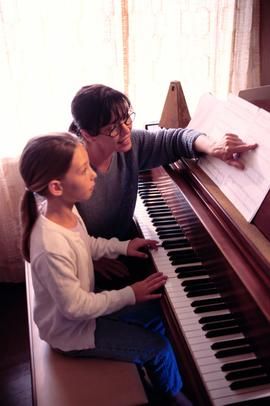 Thinkstock/Comstock/Getty Images How To Learn Piano, Group Piano Lessons, Start My Own Business, Music Theory Piano, Sheet Music With Letters, Teaching Piano, Piano Teaching Resources, Teaching Business, Learning Music