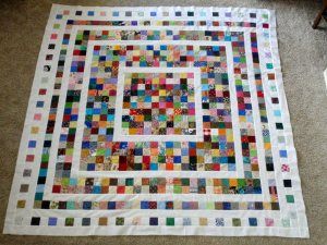 Confetti quilt -- includes tutorial - originally made with charm squares cut into quarters. can make out of scraps that 2 1/2" square. Wedding Dress Blue, Postage Stamp Quilt, Colorful Quilt, Scrappy Quilt Patterns, Charm Quilt, Scrap Quilt Patterns, Quilt Border, Scrap Quilt, Strip Quilts