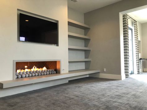 Linear Fireplaces, Contemporary Gas Fireplace, Linear Gas Fireplace, Electric Fireplace Living Room, Sleek Fireplace, Staircase Railing Design, Fireplace Shelves, Fireplace Tv Wall, Linear Fireplace