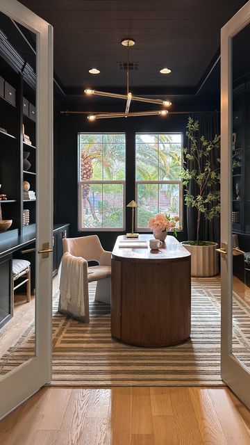 Jill Higginson on Instagram: "Would you dare to drench a room in black paint? 

Comment SHOP below to receive a DM with the link to shop this post on my LTK ⬇ https://liketk.it/4MHfK

Home office - paint color is Tricorn black by Sherwin Williams  #ltkhome #ltkvideo #ltkstyletip" Merry Everything And Happy Always, Moody Office, Office Paint Colors, Office Paint, Merry Everything, Study Inspo, Grey Dining, Office Inspiration, Home Office Design