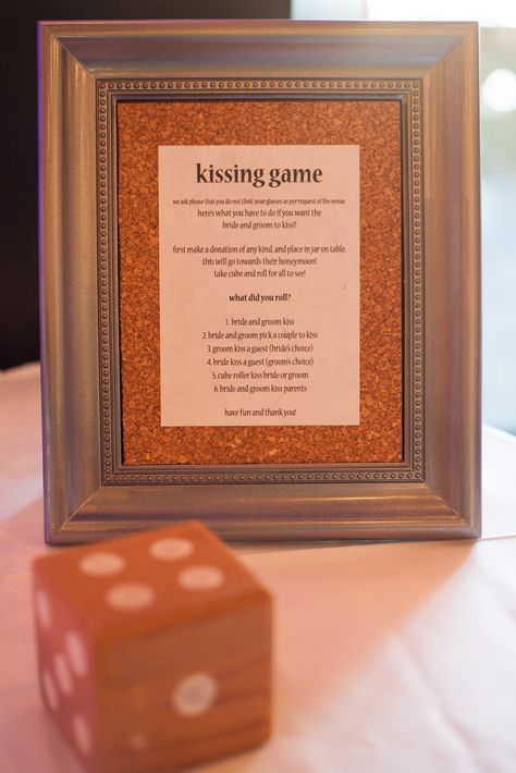 Homemade kissing game. Guest would make a donation to roll the die (hand-made, cedar). A ton of fun!! It's an incentive because the bride and groom aren't always guaranteed to kiss! Photography credit to: LauraKellyphotography.ca Wedding Dice Kissing Game, Bride And Groom Kiss Ideas Receptions, Classy Wedding Activities, Wedding Kissing Games, Kissing Menu, Kissing Games, Wedding Mc, Reception Games, Wedding Reception Games