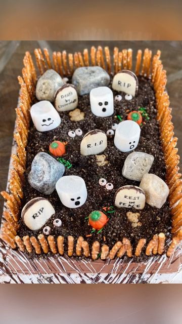 •Amy | Neuroticmom on Instagram: "Grocery store cake graveyard. The fastest, easiest, and cutest way to whip up a graveyard cake using a grocery store Sheetcake. Yes, the ink is edible and can you believe even the giant rocks are too? #graveyard #graveyardcake #halloweencake #halloweencakes #cakeideas #partyideas #easyrecipes #halloweenpartyideas" Cemetery Cake Halloween, Grave Yard Brownies, Graveyard Food Ideas, Graveyard Cake Ideas, Edible Graveyard, Zombie Cake Ideas, Brownie Graveyard, Cemetery Cake, Grocery Store Cake