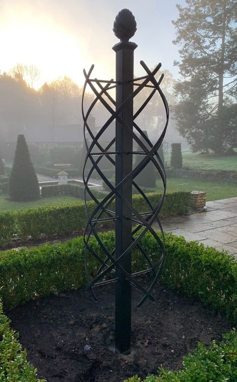 The Charleston Rose Obelisk by Classic Garden Elements, in the garden of an English castle French Country Exterior, Charleston Gardens, Classical Garden, Outdoor Garden Design, Vegetable Garden Beds, Wall Trellis, Rose Garden Design, Garden Obelisk, Homestead Farm