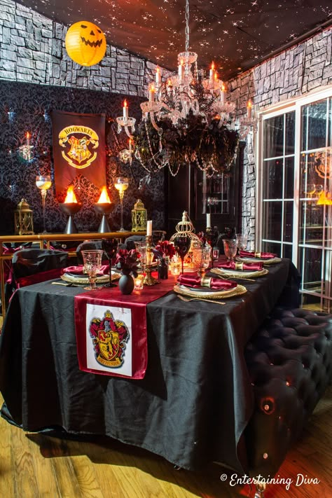 I love these Harry Potter table decor ideas for Gryffindor house. The red and gold tablescape is  awesome! #entertainingdiva #harrypottertable  #harrypotterparty #tablesettings #tablescape #tablesettings Harry Potter Party Table Decorations, Harry Potter Party Table, Harry Potter Table Decor, Harry Potter Table Decorations, Harry Potter Backdrop, Table Harry Potter, Gryffindor Decor, Gryffindor Party, Hufflepuff And Ravenclaw