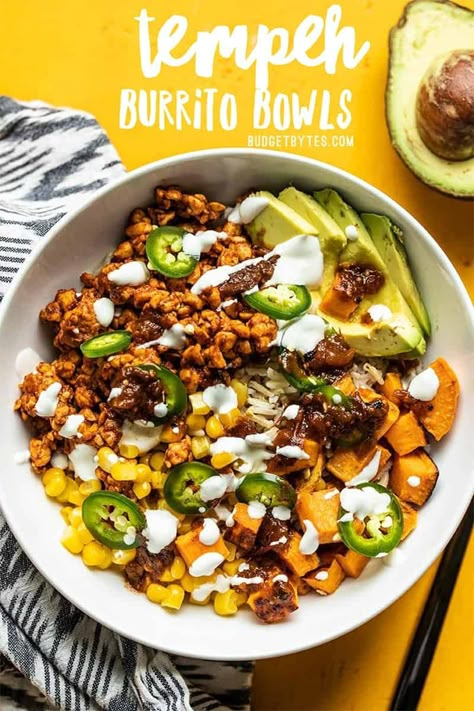 Spiced and crumbled tempeh makes a fast and easy alternative to beef in these Tempeh Burrito Bowls. Customize the toppings to be vegetarian or vegan! Budgetbytes.com #vegetarian #tempeh Tempeh Burrito, Tempeh Bowl, Burrito Bowl Meal Prep, Vegan Budget, Burrito Bowls Recipe, Tempeh Recipes, Budget Bytes, Burrito Bowls, Easy Budget