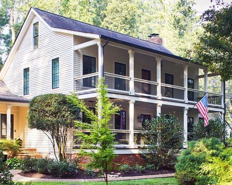 Sometimes you don’t know what you’re looking for until it falls in your lap. This was the case for Staci and Mack Vinton, who weren’t actively searching for a home when they got a call about this 1979 farmhouse in the heart of Gainesville, Georgia. After a brief tour, the couple knew it was meant to be theirs. “The house really found us,” says Mack. The property delivered on their town-and-country dreams: It stretches over 4 acres, and the neighborhood is within walking distance of the Gaines... Georgia Farmhouse, Maggie Griffin Design, Griffin Design, Gainesville Georgia, Fern Wallpaper, Classic White Kitchen, Community Housing, Cottage Renovation, Paint Color Palettes