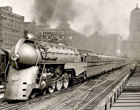 PHOTO – CHICAGO – TWENTIETH CENTURY LIMITED TRAIN (NEW YORK CENTRAL CHICAGO-NEW YORK SERVICE) – NEW STREAMLINED ENGINE LEAVING CHICAGO – 1938 | CHUCKMAN'S PHOTOS ON WORDPRESS: CHICAGO NOSTALGIA AND MEMORABILIA Orient Express Train, New York Central Railroad, John Bell, Steam Engine Trains, Railroad History, Union Pacific Railroad, Railroad Photography, Railroad Photos, Train Art