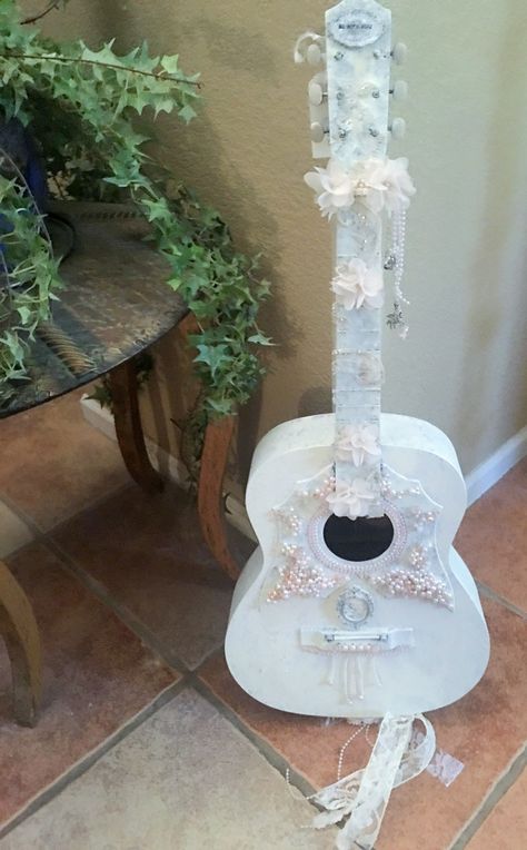 Altered, upcycled guitar -classic guitar numbered- hand-painted in antique white with pearls, delicate lace and cameo embellishments. Mixed media. Romantic Fairytale Wedding décor. Shabby Chic. Decorate Guitar Ideas, Guitar Ideas Decoration, How To Decorate A Guitar, Decorate Guitar, Paint Guitar Diy, Guitar Art Diy, Guitar Decorations, Fairytale Wedding Decorations, Shabby Chic Violin