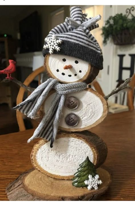 Just when you thought snowmen couldn't get cozier, this rustic wood slice snowman proves otherwise. Crafted from natural wood, it features a charming scarf, tiny buttons, and a cute winter hat. Snowman Hat Crafts Diy, Snowman Out Of Wood Slices, Wood Slice Snowmen, Snowman Out Of Wood, Wood Circle Snowman, Wood Round Snowman, Log Snowman Diy Wood Slices, Wood Snowmen Crafts, Wood Winter Crafts