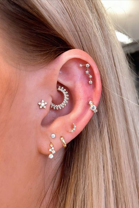 Discover the UK's finest selection of dainty solid gold cartilage huggies, hoops & studs for helix, high lobe, rook, tragus, daith and conch at Laura Bond. We ship worldwide! High Ear Lobe Piercing, Daith Piercing Combination, Daith Curated Ear, Curated Ear Piercing Daith, Stacked Ear Lobe Piercing, Conch And Daith Piercing Together, Cute Ear Piercings Combinations, High Lobe Piercing, Stacked Lobe Piercing