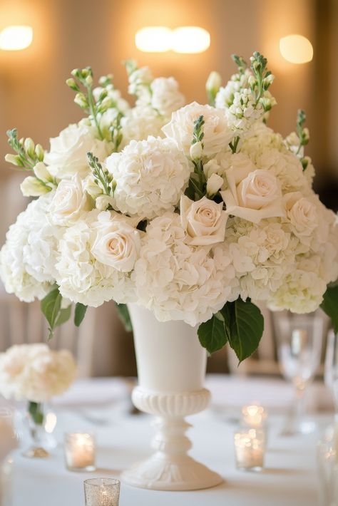 Crisp White Elegance Tall Wedding Table Centerpiece Centerpiece Stands Wedding, Peonies And Hydrangeas Centerpieces, Hydrangeas Wedding Centerpieces, White Rose And Hydrangea Centerpiece, Raised Centerpieces Wedding, Hydrangea Table Centerpiece, Hydrangea Table Arrangements, White Wedding Floral Centerpieces, White Centerpiece Wedding