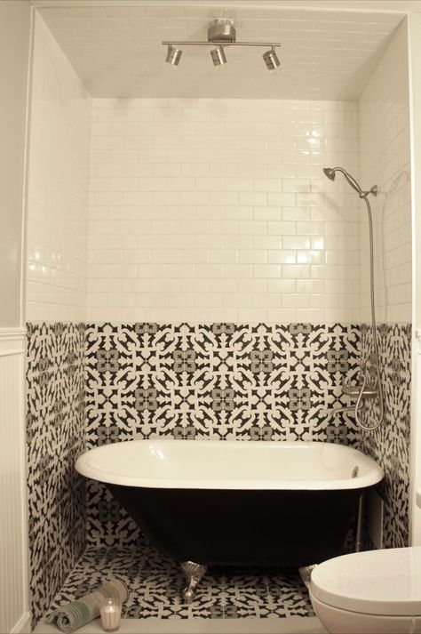 Modern bathroom with a twist including clawfoot tub and beautiful tile design Footed Tub Bathroom, Small Bath With Clawfoot Tub, Clawfoot Tub With Glass Enclosure, Tile Around Clawfoot Tub, Clawfoot Tub Backsplash, Restored Clawfoot Tub, Clawfoot Tub In Shower Stall, Freestanding Tub Tile Surround, Clawfoot Tub Faucet Ideas