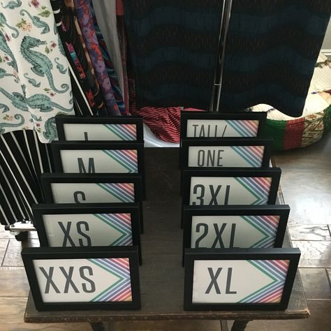 Creating your in home LuLaRoe Boutique. Use simple frames for your sizes and/or styles! Home Boutique Ideas, Lularoe Room, Boutique Display, Lula Roe, Setup Ideas, Floral Ornament, Lularoe Styling, Desk Phone, Unique Boutique