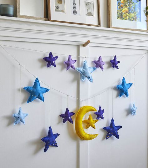 How To Make Felt Moon and Star Garland Online | JOANN Diy Moon Decorations Craft Ideas, Felt Garland Diy, Felt Star Garland, Felt Moon, Moon Garland, Baby Gadget, Ramadan Craft, Felt Stars, Diy Felt Christmas Ornaments