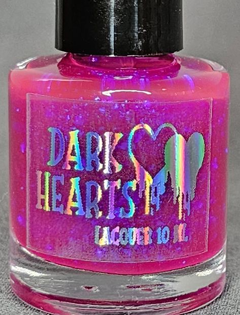 Nebula is a bright pink polish with blue flakes.  Dark Harts lacquer is vegan/cruelty free, and 10 free. This means our polish is free of 10 of the most common toxins found in most nail polishes.  Hand mixed small batch nail polish in 10ml mini bottles.  For best results apply 2-3 coats for your desired color.  Actual color may vary depending on your screens resolution and color settings.  No returns/exchanges. We are not responsible for lost or stolen packages. Glow In The Dark Nail Polish, Cheap Nail Polish, Sinful Colors Nail Polish, Dark Nail Polish, Birthday Nail Designs, Confetti Nails, Pretty Nail Polish, Pink Polish, Sinful Colors