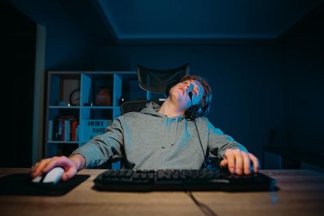 Tired gamer sits at home at the computer... | Premium Photo #Freepik #photo #playing-game #gamer #cybersport #gaming-computer Character Role, Sleep Dream, Most Popular Games, Dream Interpretation, Top Game, Tomb Raider, Popular Games, Grand Theft Auto, Jurassic Park