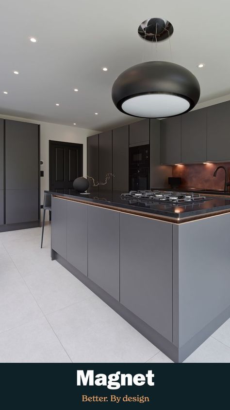 This dark and decadent Integra Soho Magnet Kitchen in Charcoals adds a sleek, contemporary look to a Victorian house. The Charcoals tone perfectly complements the grey hues of the rest of our home, and creates a striking effect when you walk in. With handleless frontals and a functional island, this kitchen ticks every box. Click the pin to explore this Magnet customer kitchen in full. Charcoal Grey Kitchen, Kitchen Splashback Designs, Ideas Bookmark, Kitchen Victorian, Kitchen Cabinets And Backsplash, Splashback Ideas, Charcoal Kitchen, Monochrome Kitchen, Period Property