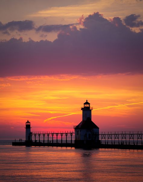 St Joe Sunset - Sunset over Lake Michigan at St Joseph Michigan's famous Lighthouse. St Joe Michigan, Michigan Beach Vacations, One Two Buckle My Shoe, Michigan Beach Towns, Buckle My Shoe, St Joseph Michigan, Charlevoix Michigan, Smokey Mountains Vacation, Sunset Over Lake