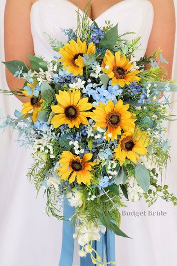 Sunflower Bouquet With Blue Flowers, Sunflower And Bluebonnet Bouquet, Dahlias Bouquet Wedding, Blue Flowers And Sunflowers, Sunflower With Blue Flowers, Bouquets For Blue Dresses, Bridal Sunflower Bouquet, Blue Sunflower Bouquet, Sunflowers And Forget Me Nots