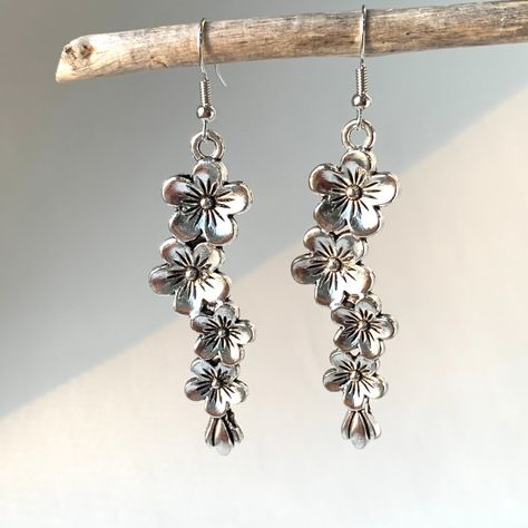 This Big, Bold Pair Of Silver Flower Earrings Reflect A Lot Of Light From The Edges Of The Flower Petals. The Inner Details, With A Slight Patina, Add Dimension To The Design While The Organically Stacked Pattern Has A Natural Feel. These Earrings Really Stand Out! Silver Plated Flowers & Ear Wires. Approx. Size: 2-7/8"L, 5/8"W New, Handmade By: Jpeace Designs Boho, Trendy, Free People Style, Earthy Organic ~Also Available In Brass, See My Other Listing And Last Photos~ Silver Floral Jewellery, Handmade Earrings Silver, Silver Floral Earrings, Unique Silver Earrings, Vintage Earrings Silver, Silver Flower Jewelry, Cool Silver Earrings, Unique Jewelry Silver, Silver Vintage Earrings