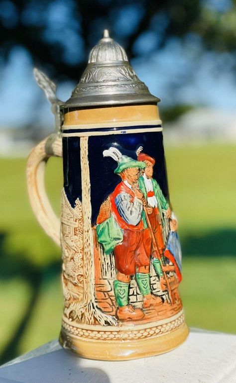 17 Most Valuable German Beer Stein Markings (Identification & Value Guide) German Stein Tattoo, Beer Stein, Beer Steins Pottery, Germany Food, Viking Glass Vintage, German Beer Mug, Beer Cup, German Beer Steins, German Beer