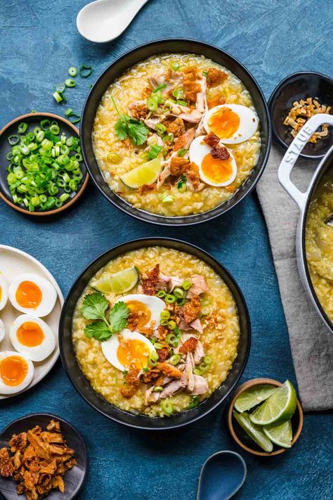 Arroz Caldo finished in bowls with toppings Filipino Arroz Caldo, Filipino Arroz Caldo Recipes, Arroz Caldo Filipino Recipe, Arroz Caldo Recipe, Caldo Recipe, Filipino Rice, Garlic Chips, Filipino Dish, Crispy Garlic