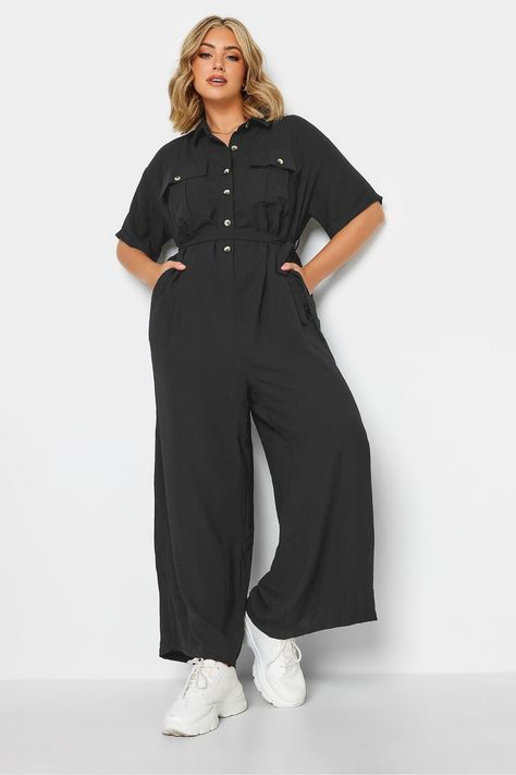 An all-in-one outfit that can be dressed up or down. Made from a comfortable woven fabric, this jumpsuit features short sleeves, a classic collar, button fastenings, and an adjustable tie waist in a wide-leg style. Pair with trainers for a more casual look. Why We Love It: Stylish yet comfortable.Model is 58/173 cm and size UK 16/EU 44 Machine washable. 100% Polyester. Size 20 Women, Elegant Wedding Guest Dress, Size 16 Women, Black Playsuit, Plus Swimwear, Curve Fashion, Boiler Suit, Next Fashion, Xl Fashion