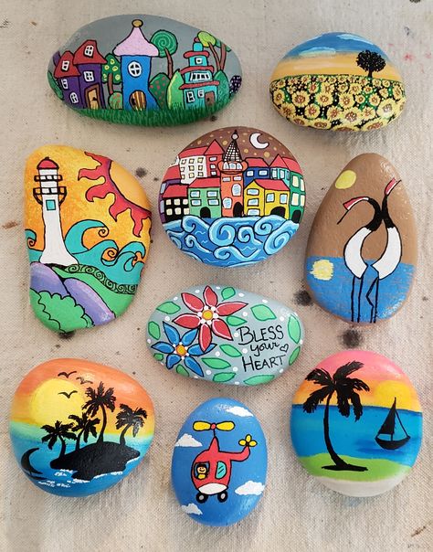 Painted Rocks, Funky Town, Houses, Moon, Waves, Lighthouse, Sunset, Sunrise, Rolling Hills, Island, Sailboat, Palm Trees, Salt Life, Ocean, Sea, Helicopter, Chopper, Pilot, Coastal Cranes, Coastal Birds, Bless Your Heart, Flowers, Sunflowers, Meadow, #SSBMandi Ocean Rock Painting, Lighthouse Sunset, Flowers Sunflowers, Coastal Birds, Garden Rock Art, Town Houses, Diy Rock Art, Stones Art, Stone Art Painting