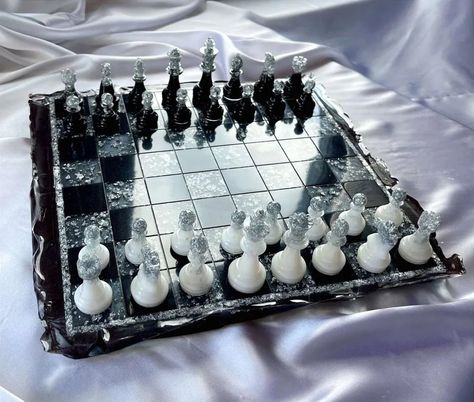 Handmade black white Chess set made of epoxy resin with chess figures |Chess pieces resin|Resin Chessboard|Resin Art|Board Game| Chess gift Exclusive chess in a single copy made of epoxy resin. The game board is made in the form of a piece of ice, it looks very impressive. ✅️ chess board - 1 pc.; ✅️ chess pieces - 32 pcs.; *Chessboard size: 31x31 cm; thickness height 2.5 cm *Chess pieces: new, solid (without seams), sizes: from 3.40 cm (pawn height) to 6.77 cm (king height), diameter from 2.0 cm (pawn) to 2.5 cm (king) Chess Resin, Resin Chess Pieces, Chess Figures, Chess Gifts, Chess Set Unique, Pearl Ex, Father And Baby, Diy Resin Projects, Epoxy Resin Crafts