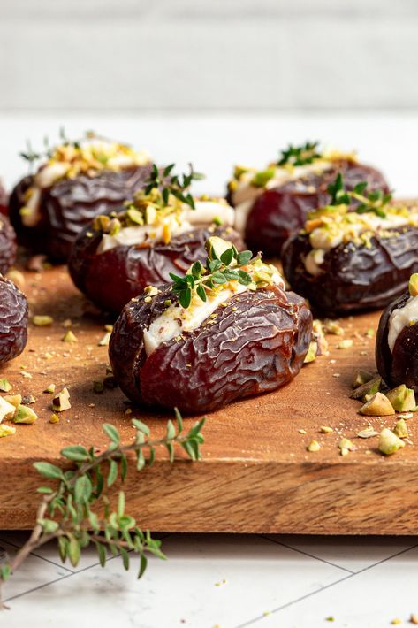 Vegan Stuffed Dates are the perfect bite of sweet and savory. Soft, luscious medjool dates surround a savory, creamy plant-based filling. These stuffed dates are an easy appetizer or snack. Ready in just 15 minutes! Vegan Apps, Stuffed Dates, Vegan Party, Vegan Thanksgiving Recipes, Date Recipes, Whipped Feta, Oil Free Vegan, Appetizer Bites, Savory Vegan