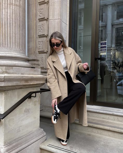 The new samba colour way & my wardrobe 🤝🏻🤎 outfit details below & linked on my @shop.ltk . . Coat - @nakdfashion old Cashmere turtle neck - @uniqloeurope Black trousers - @warehouseuk old Trainers - @adidas black & cream samba colourway. Size up if you have wide feet! Bag - @cafune.official Belt - @amazonfashioneu Sunglasses - @ysl . . Adidas sambas, camel coat, black trousers, cream turtle neck, winter outfits, transitional outfits . . #adidassambaclassic #adidassambas #adidassambas... Beige And Black Winter Outfit, Cream Sambas Outfit, Trousers Winter Outfit, Cream Outfit, Transitional Outfits, Trainers Adidas, Samba Outfit, Adidas Sambas, Wide Trousers