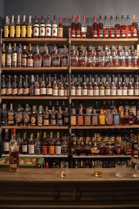 This Home Bar is a Legend in Austin, TX. Here's How to Build Your Own. | Huckberry Bourbon Bars Home, At Home Whiskey Bar, Bourbon Cabinet Ideas, Whiskey Glass Display, Bourbon Display Ideas, Liquor Closet, Bourbon Collection Display, Whiskey Display Ideas, Whiskey Collection Display